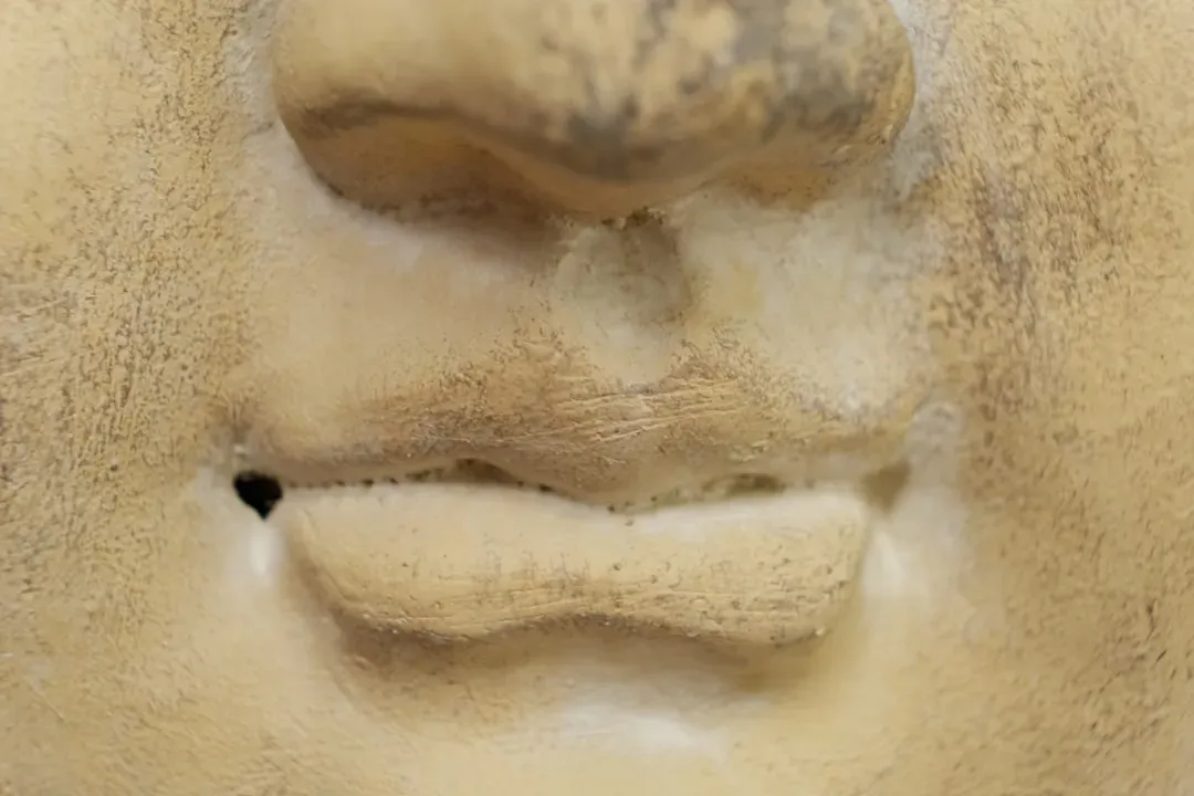 Profile view of defined jawline showing angular chin contours, illustrating results from weak jawline surgery options like ge