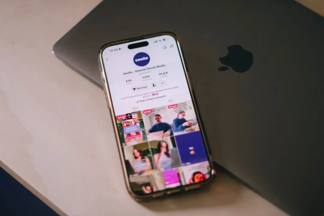 Smartphone displaying looksmaxxing chart with appearance rating tiers and face classification scales on social media feed